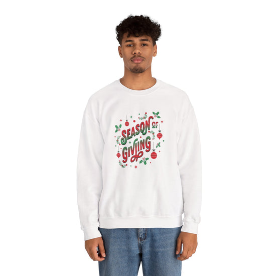 Cozy Holiday Sweatshirt Season of Giving Unisex Crewneck Perfect Gift Christmas Winter Wear Comfortable Stylish Heavy Blend Festive Sweatshirt Printify